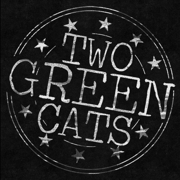 Two Green Cats